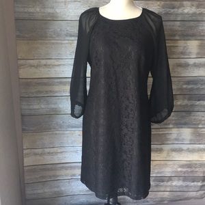 Lined black lace dress w/ sheer sleeves.